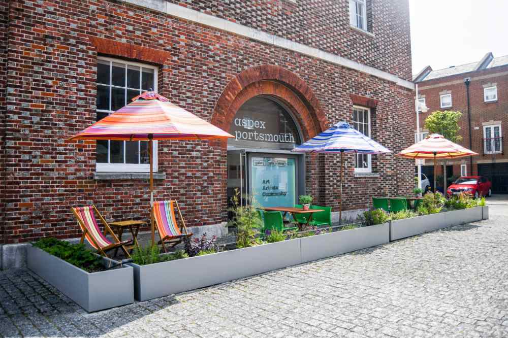 umbrella outside the brick made building