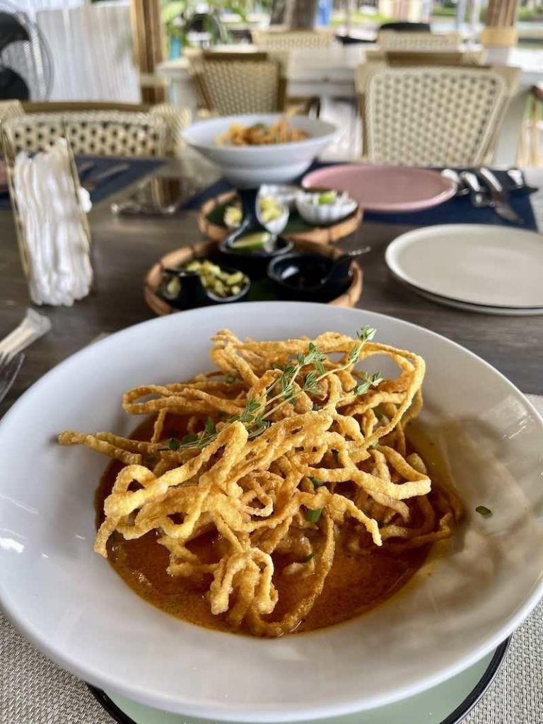 khao soi - chiang mai dish in white plate