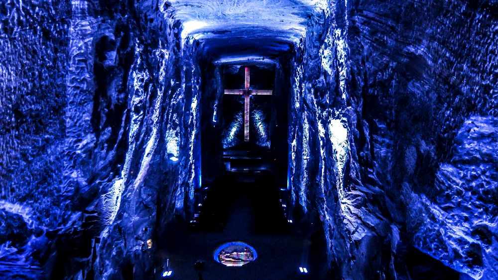 underground The Salt Cathedral with cross in the middle in color blue background - Underground Attractions
