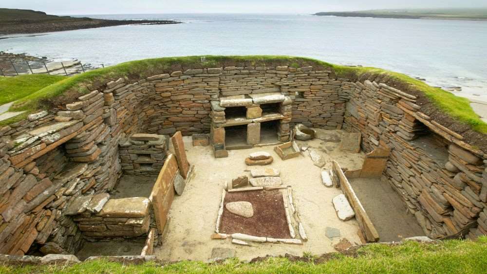 stone made structure near body of water- Things to Do in Scotland